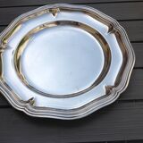 Silver metal dish with twisted edges