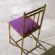 small golden metal accent chair