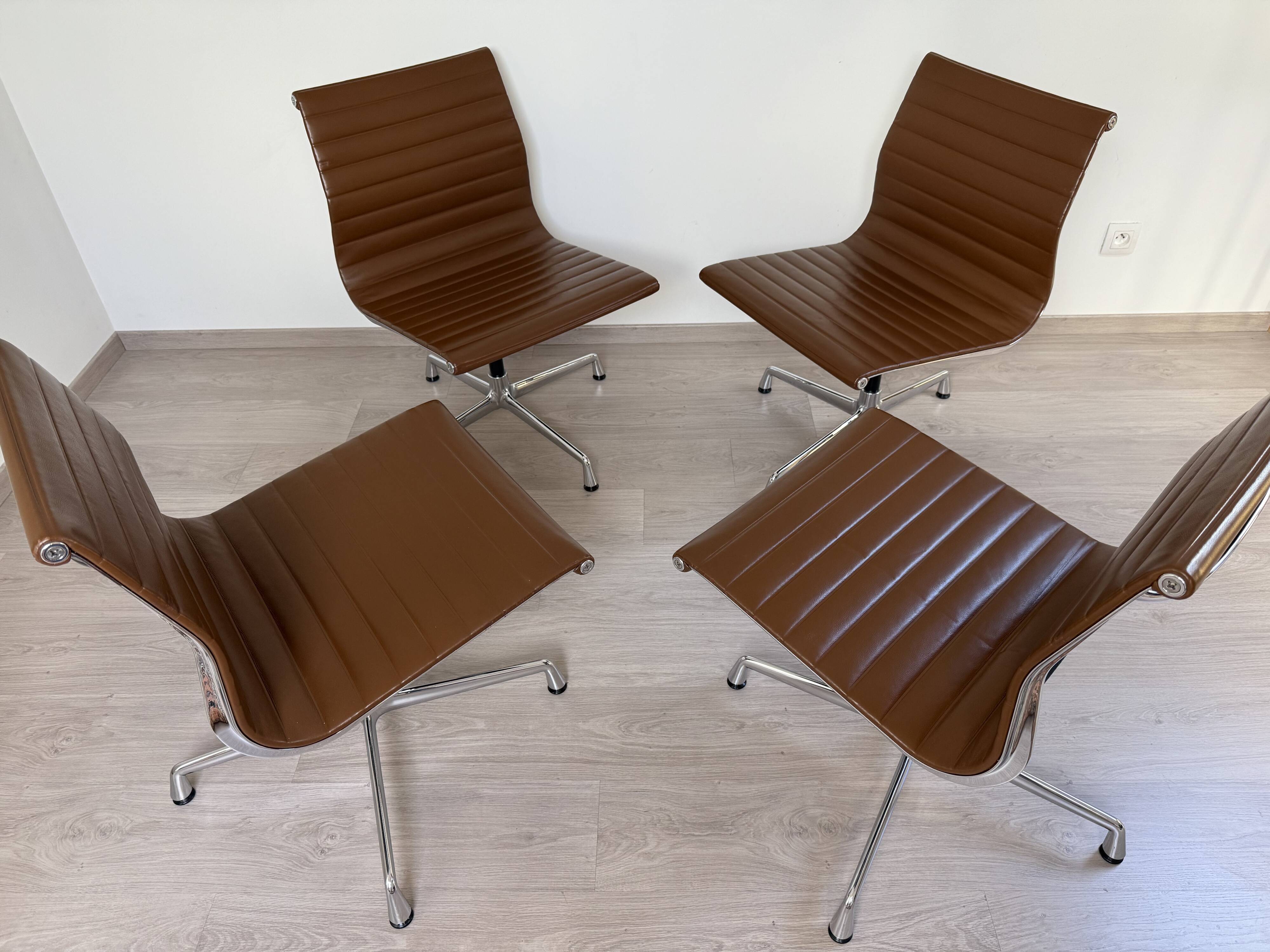 Set of 4 Eames EA105 Vitra armchairs from 2007