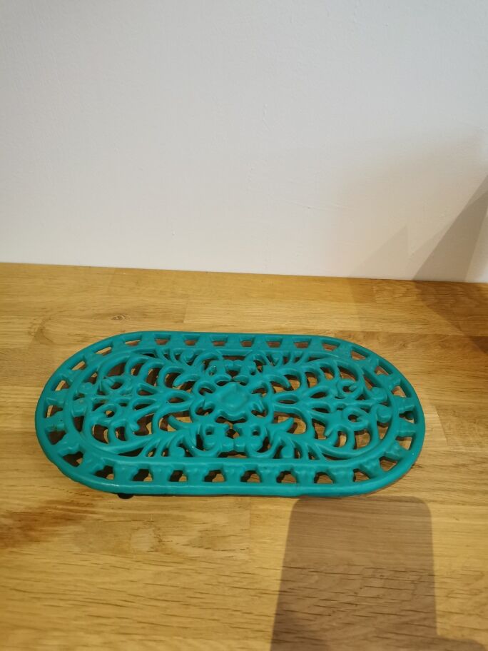 underside of the cast iron dish painted blue