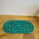 underside of the cast iron dish painted blue