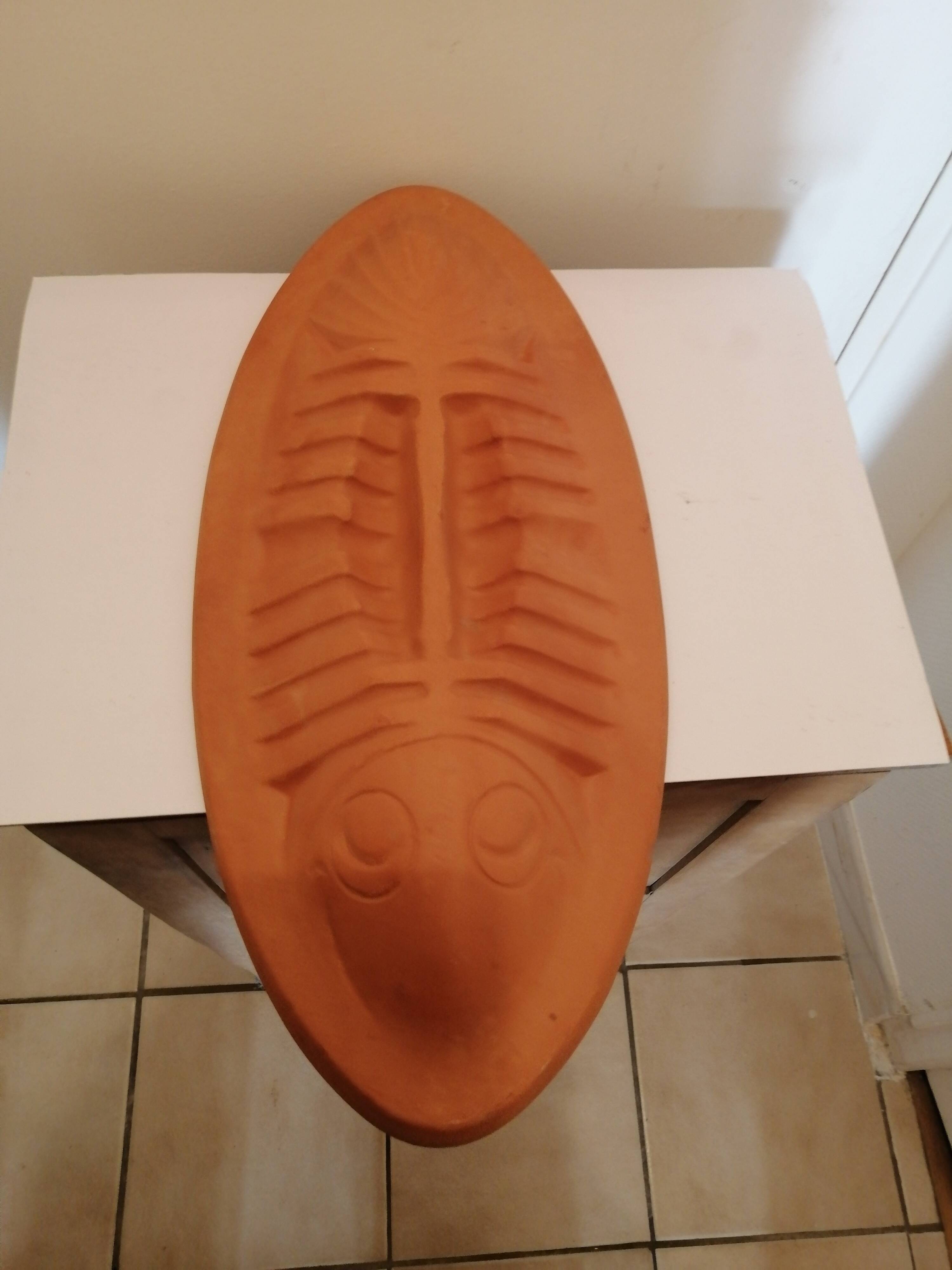 Fish shaped terracotta cooking dish
