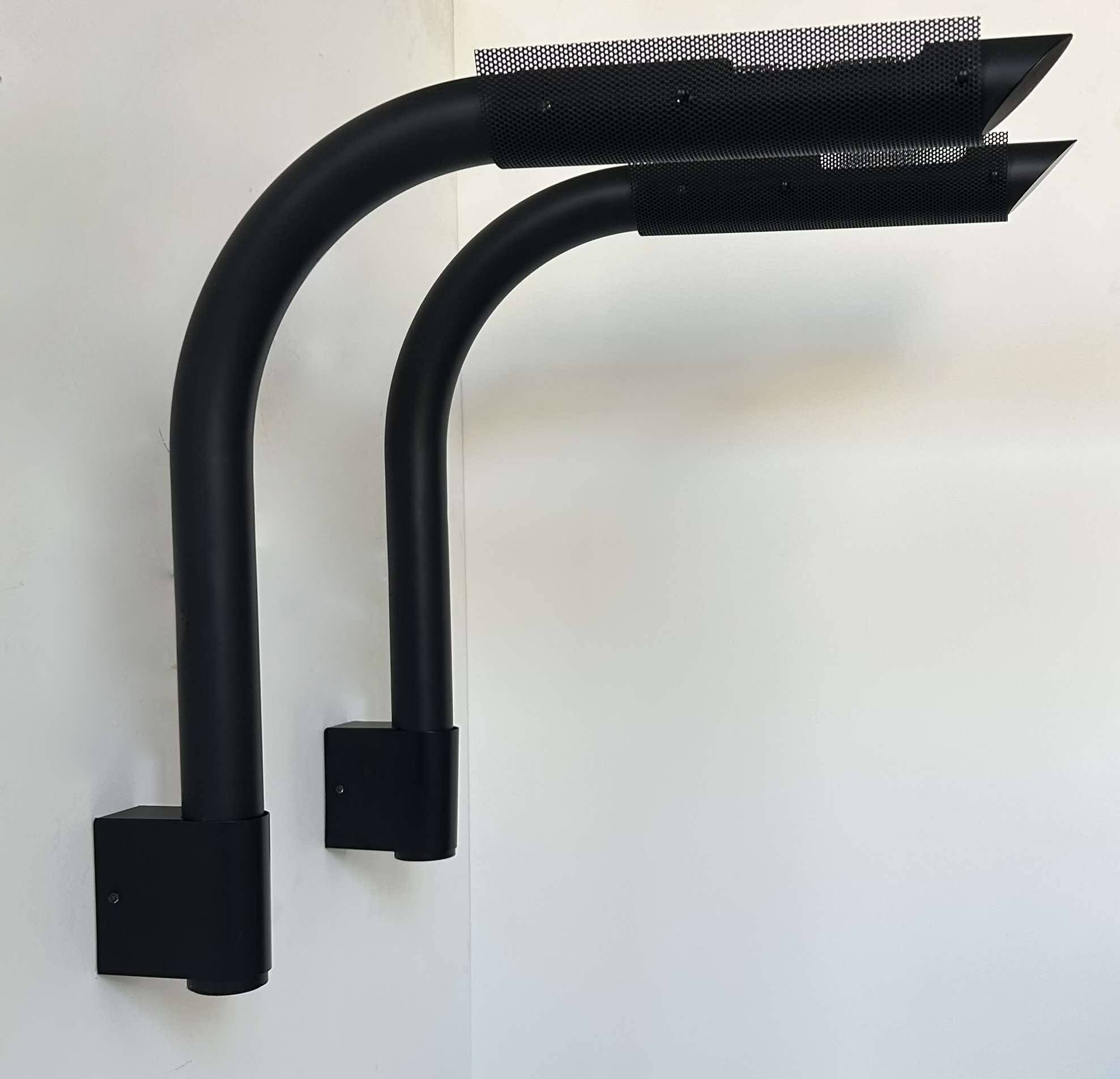 Pair of vintage wall lights, tubular and perforated black metal, Parscot France 1980