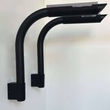 Pair of vintage wall lights, tubular and perforated black metal, Parscot France 1980