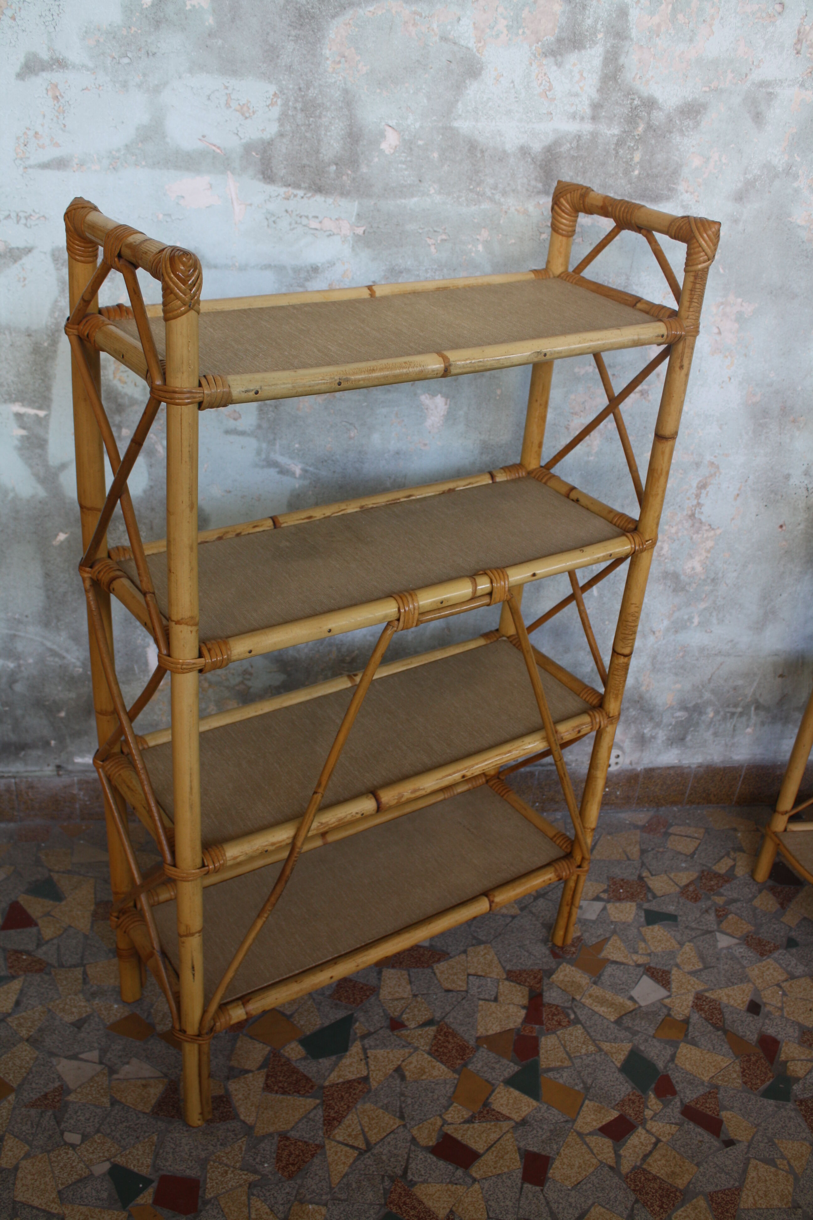 Pair of rattan shelves including a corner shelf