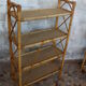 Pair of rattan shelves including a corner shelf