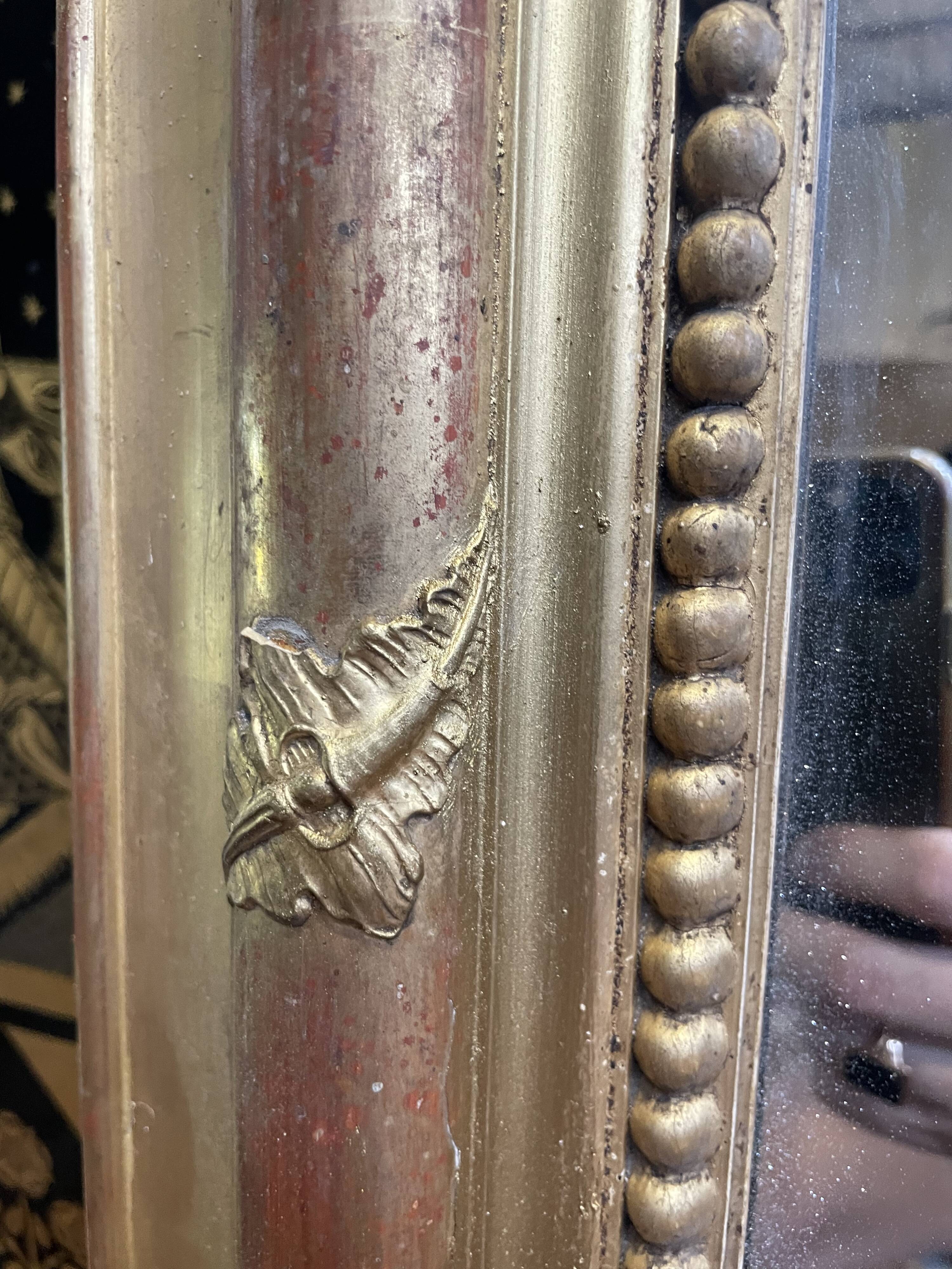 Louis Philippe period mirror in gilded stucco 100x147cm