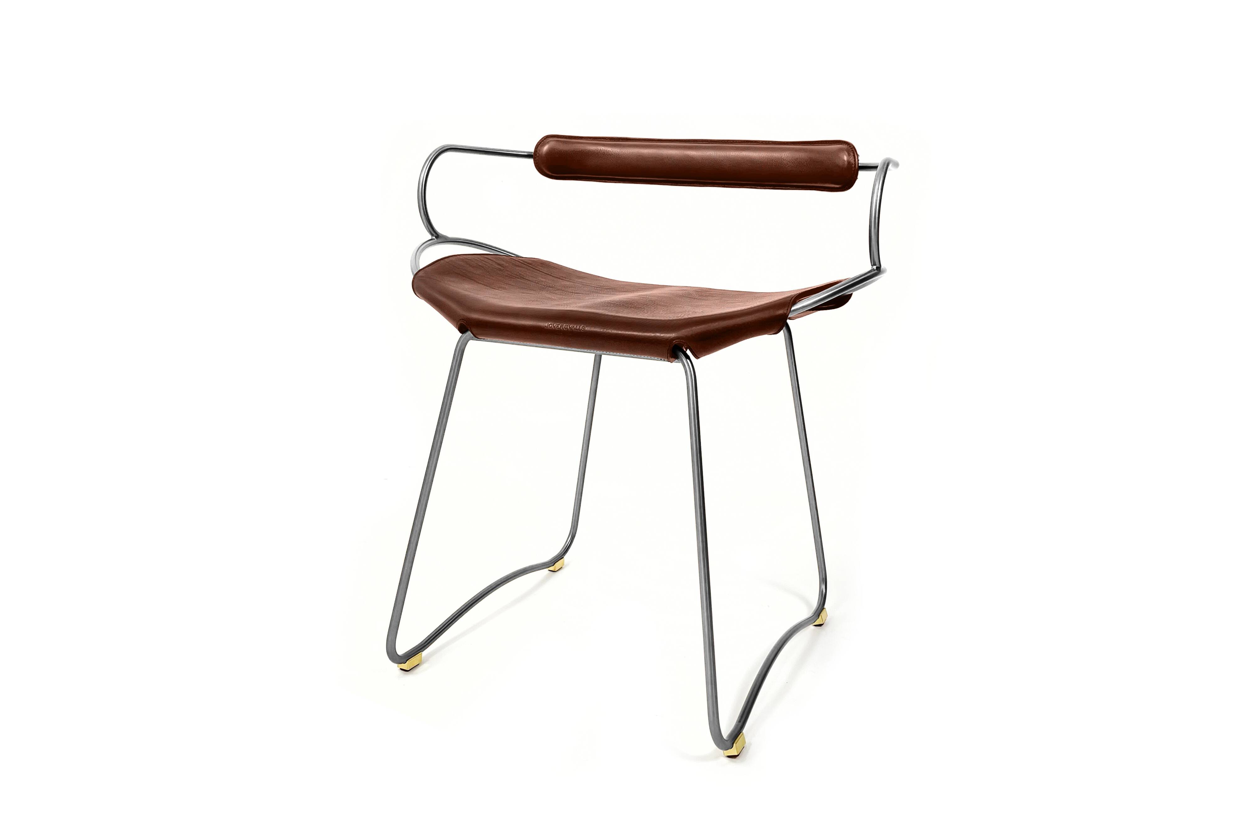 Bar stool with a back, aged silver metal and natural tobacco leather, organic design.