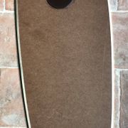 Vintage 1960 free-form mirror known as a retro mirror with a gold and black metal trim.