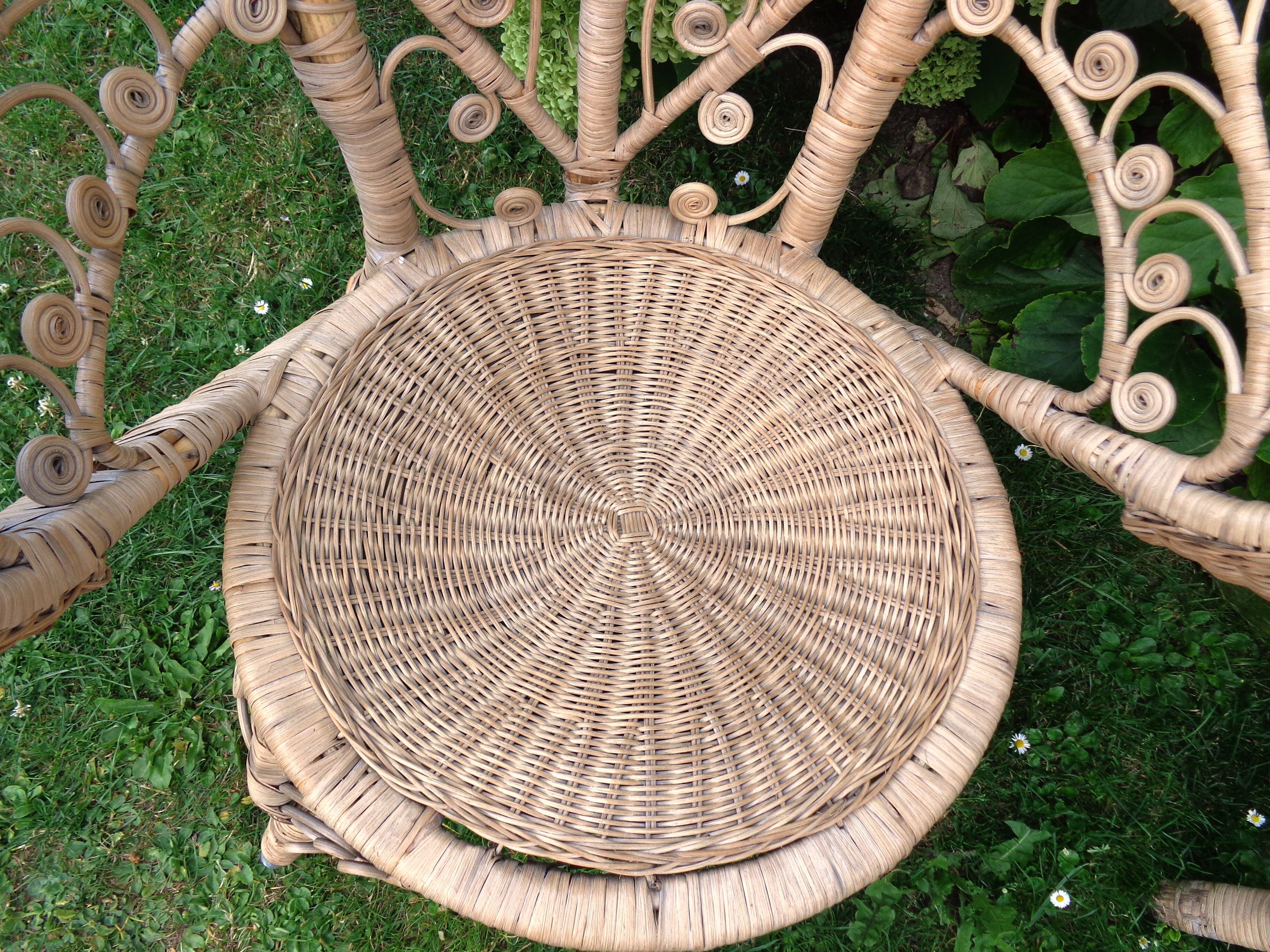 Pair of vintage rattan peacock armchairs