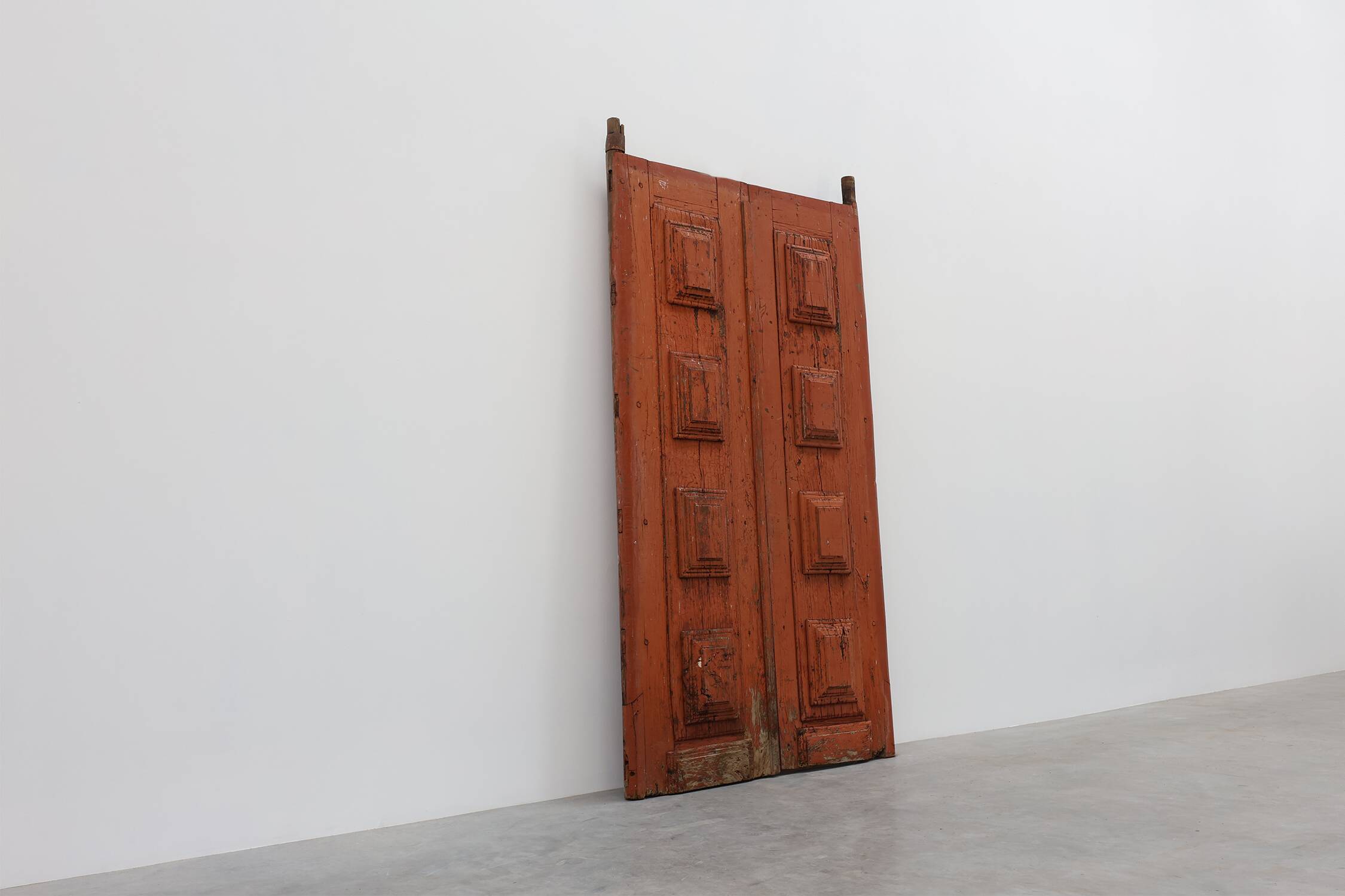 Large 17th century Monastery doors in terracotta lacquered oak, Portugal