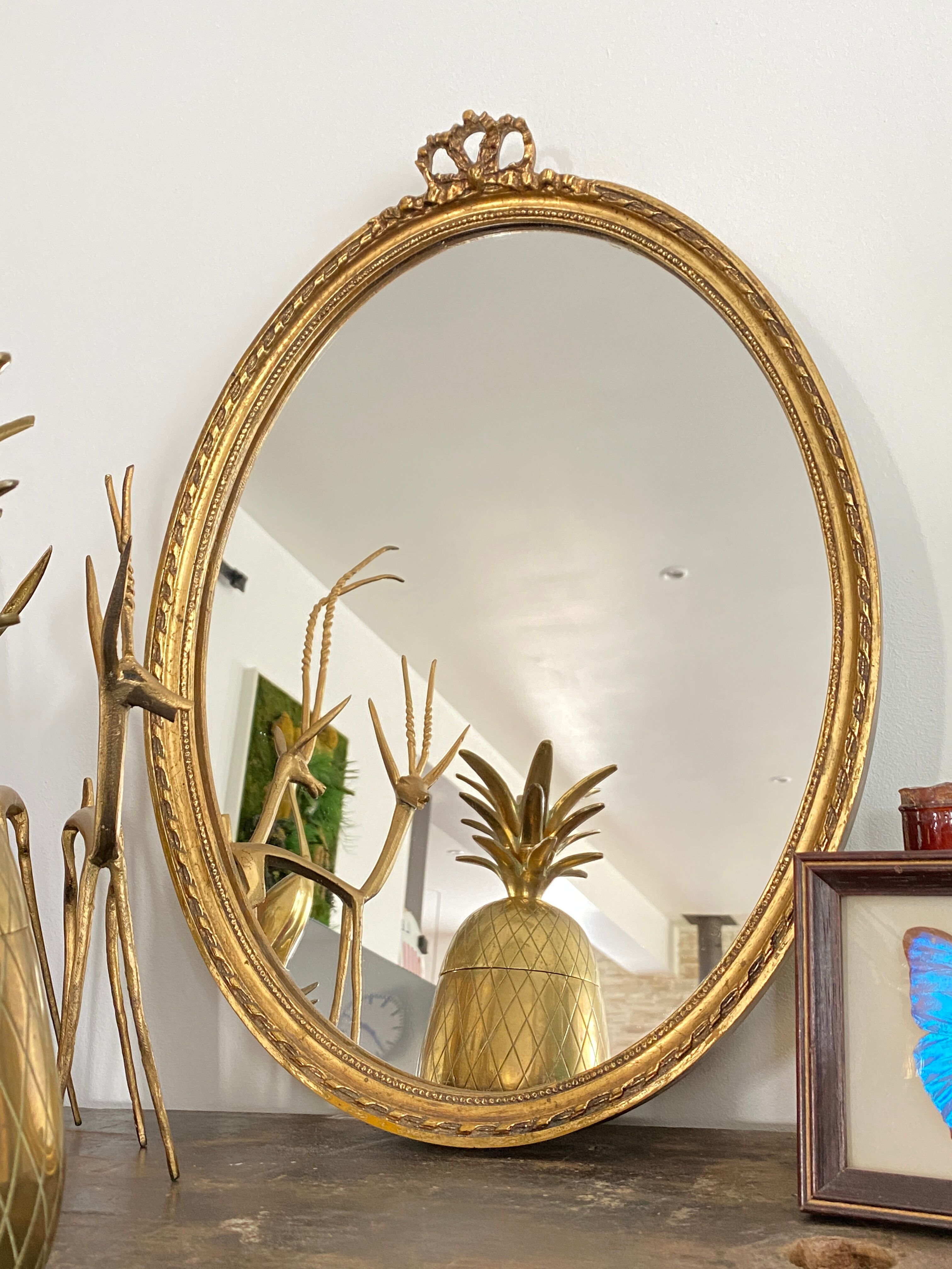 Golden oval mirror 32x44cm