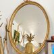 Golden oval mirror 32x44cm