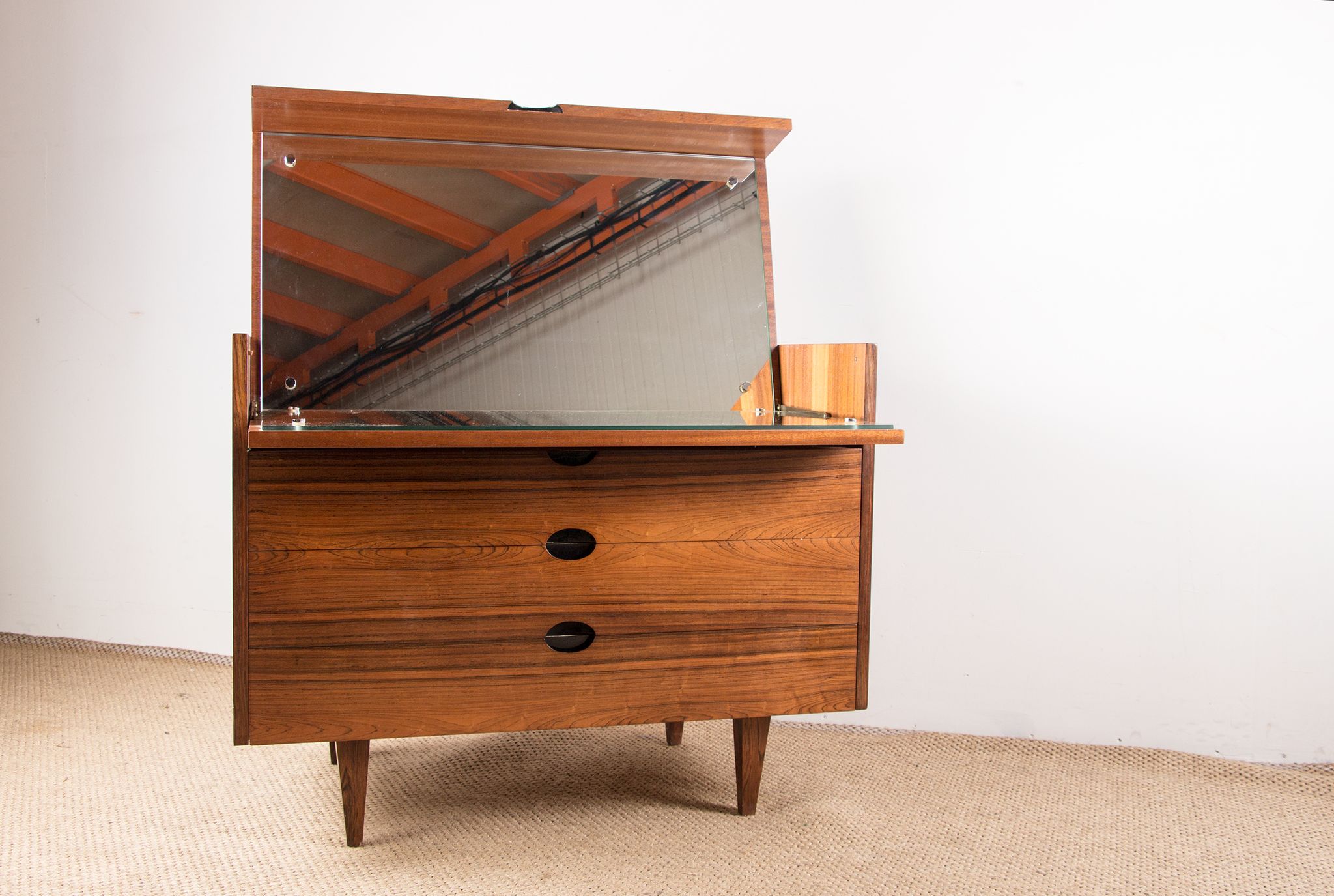 Rosewood chest of drawers designed by Paul Geoffroy published by Roche Bobois.