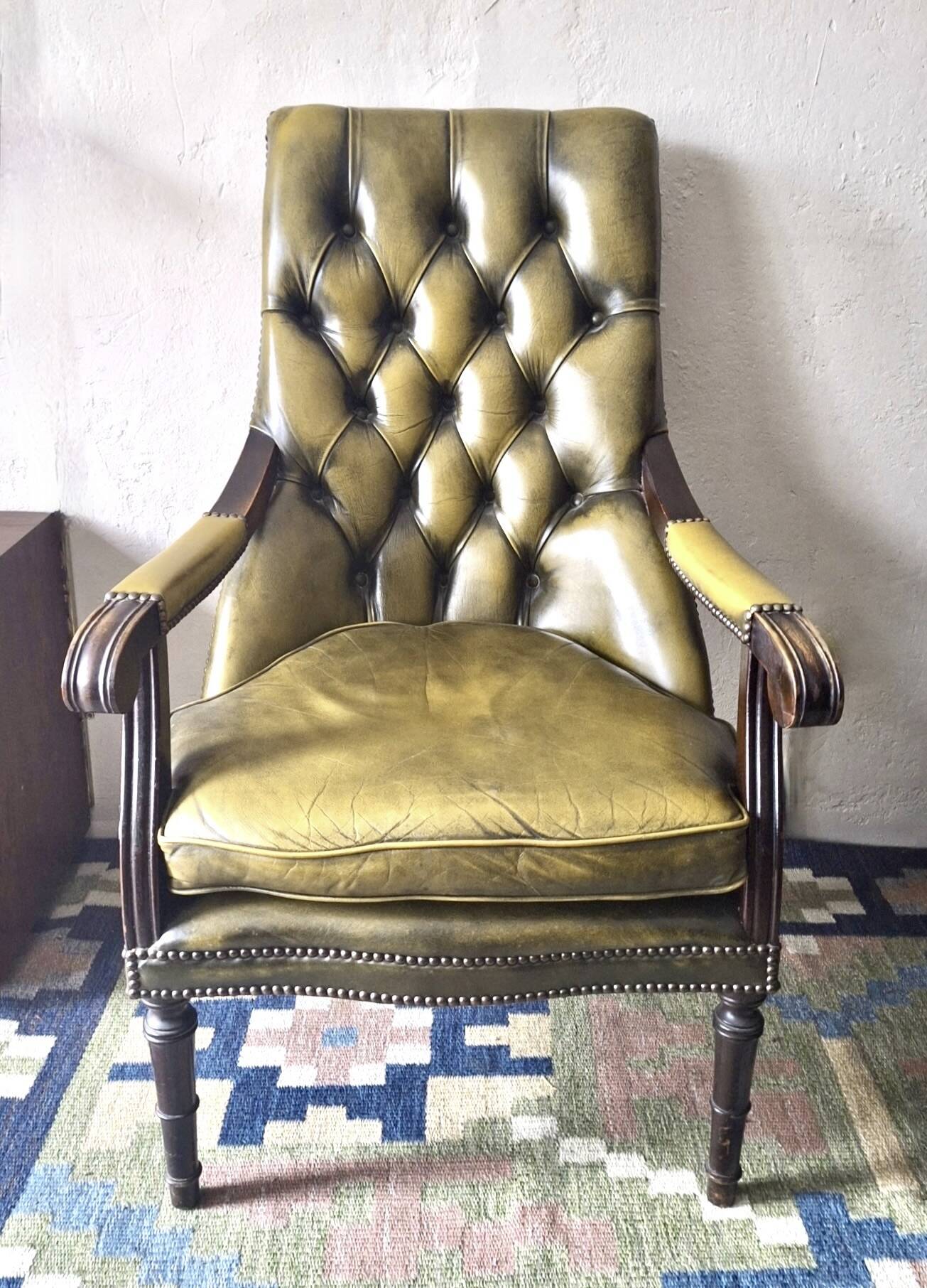 Olive green tufted leather library armchair, 1970s