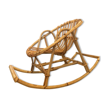 Rocking chair enfant en rotin vintage