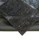 Hand-knotted turkish vintage 170 cm x 243 cm black patchwork rug