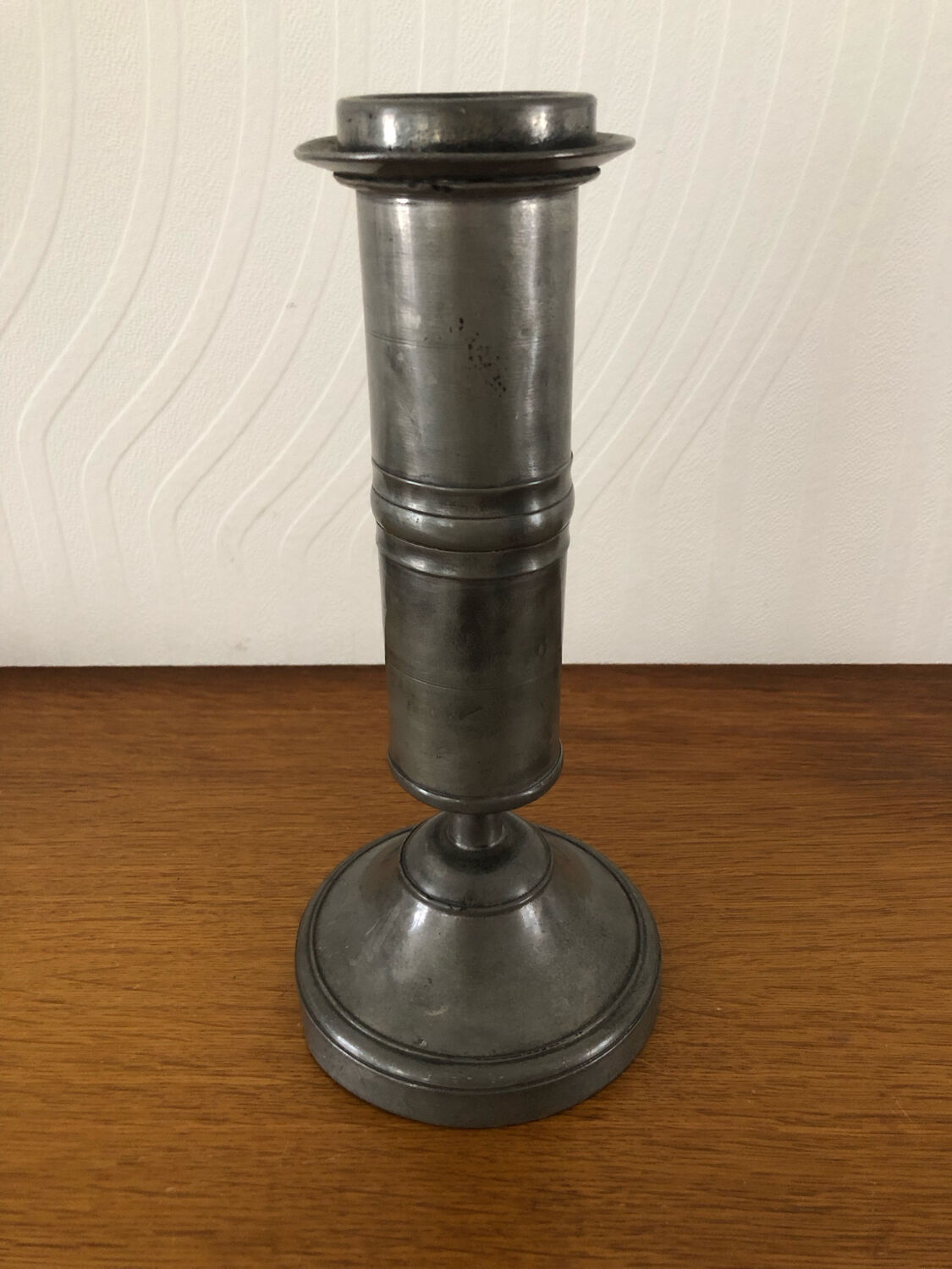 Antique pewter candle holder