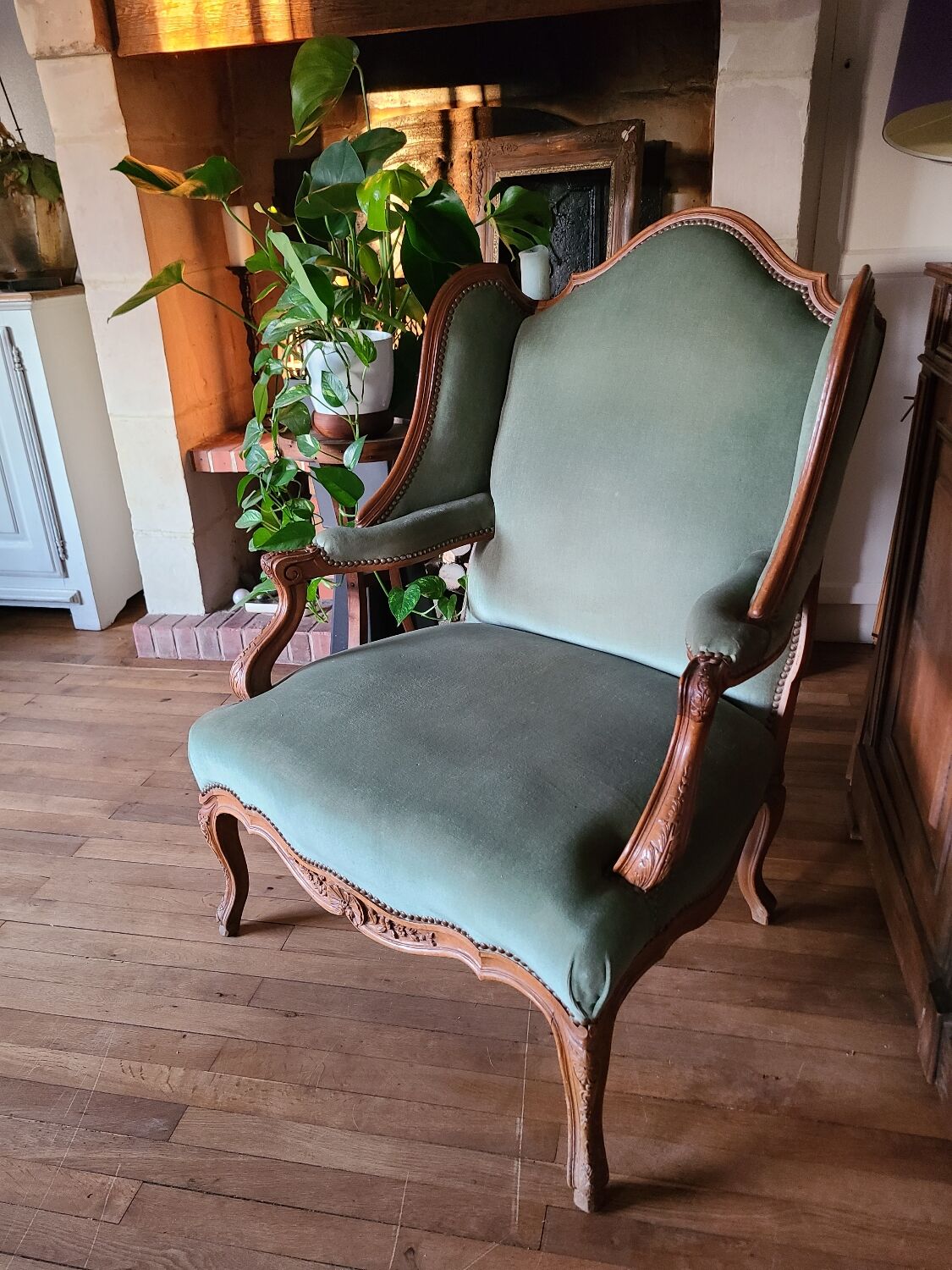 Vintage Louis XV style wing chair, light green velvet