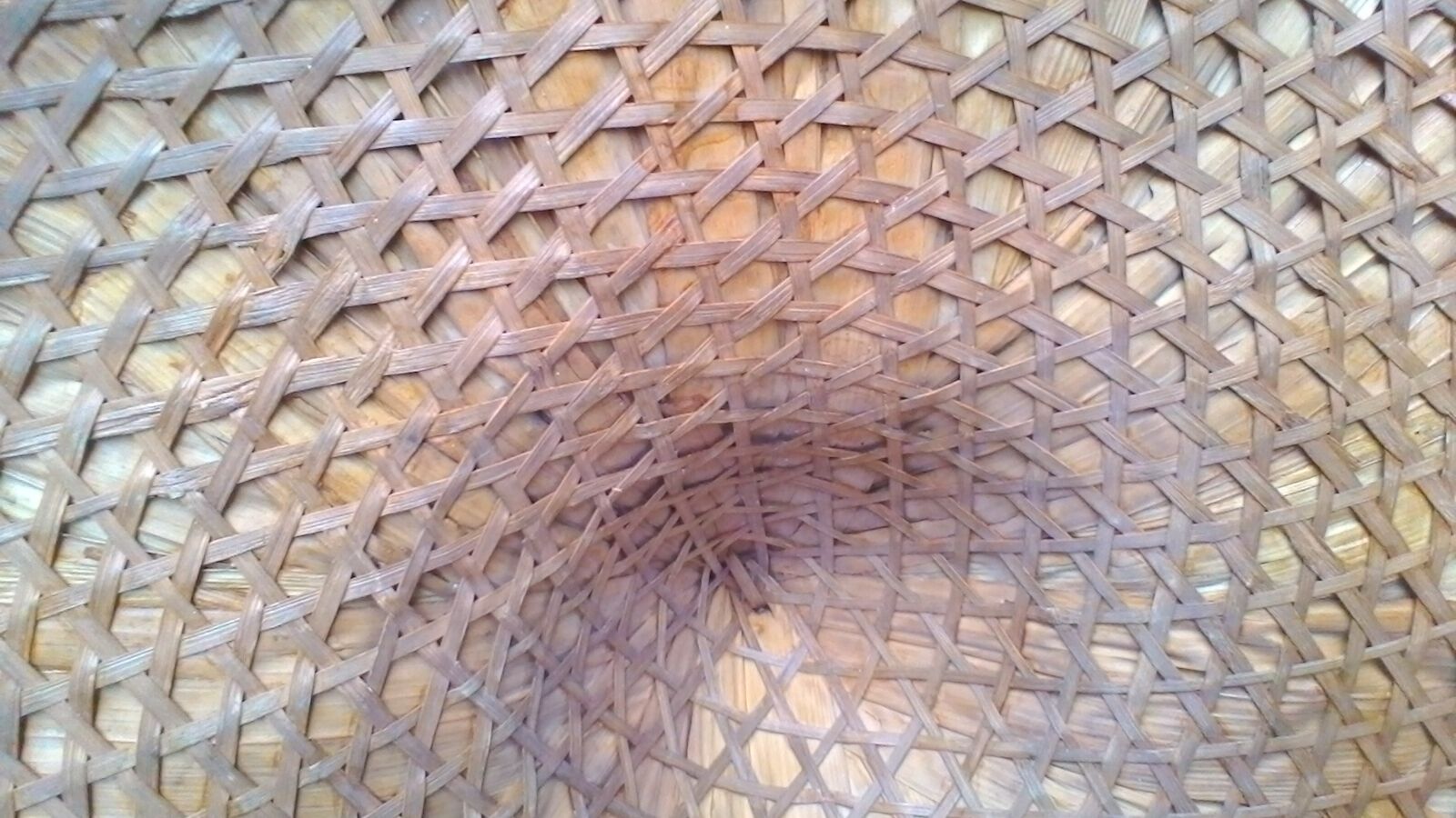 Vintage Asian hat braided palms and bamboo for decoration