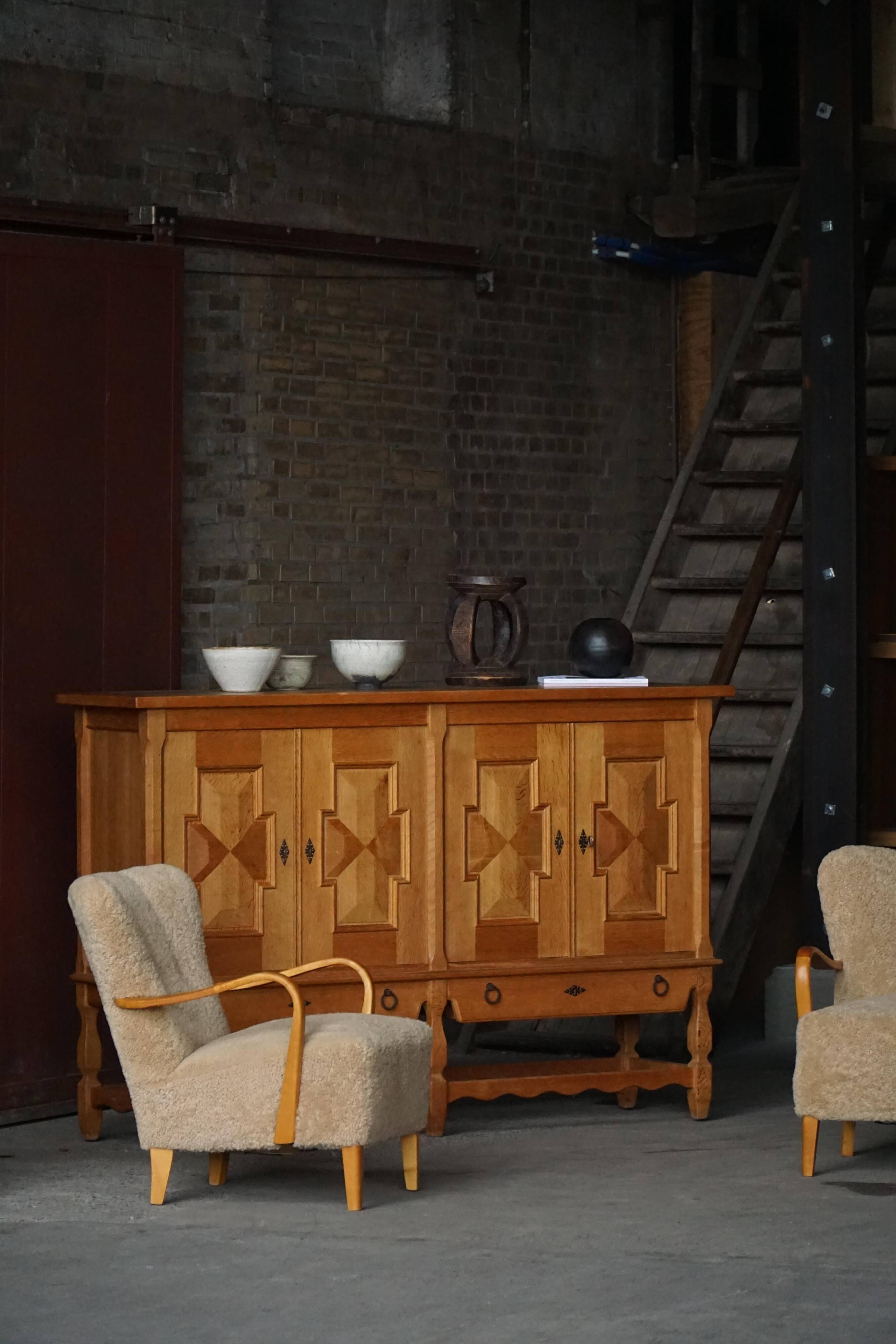 Henning Kjærnulf, enfilade in oak, mid-century Danish, Nyrup Møbelfabrik, 1960s.