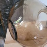 Round smoked glass vase with star pattern