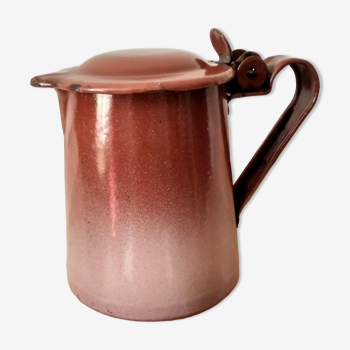 Old pitcher in brown enamelled sheet metal, spout and lid