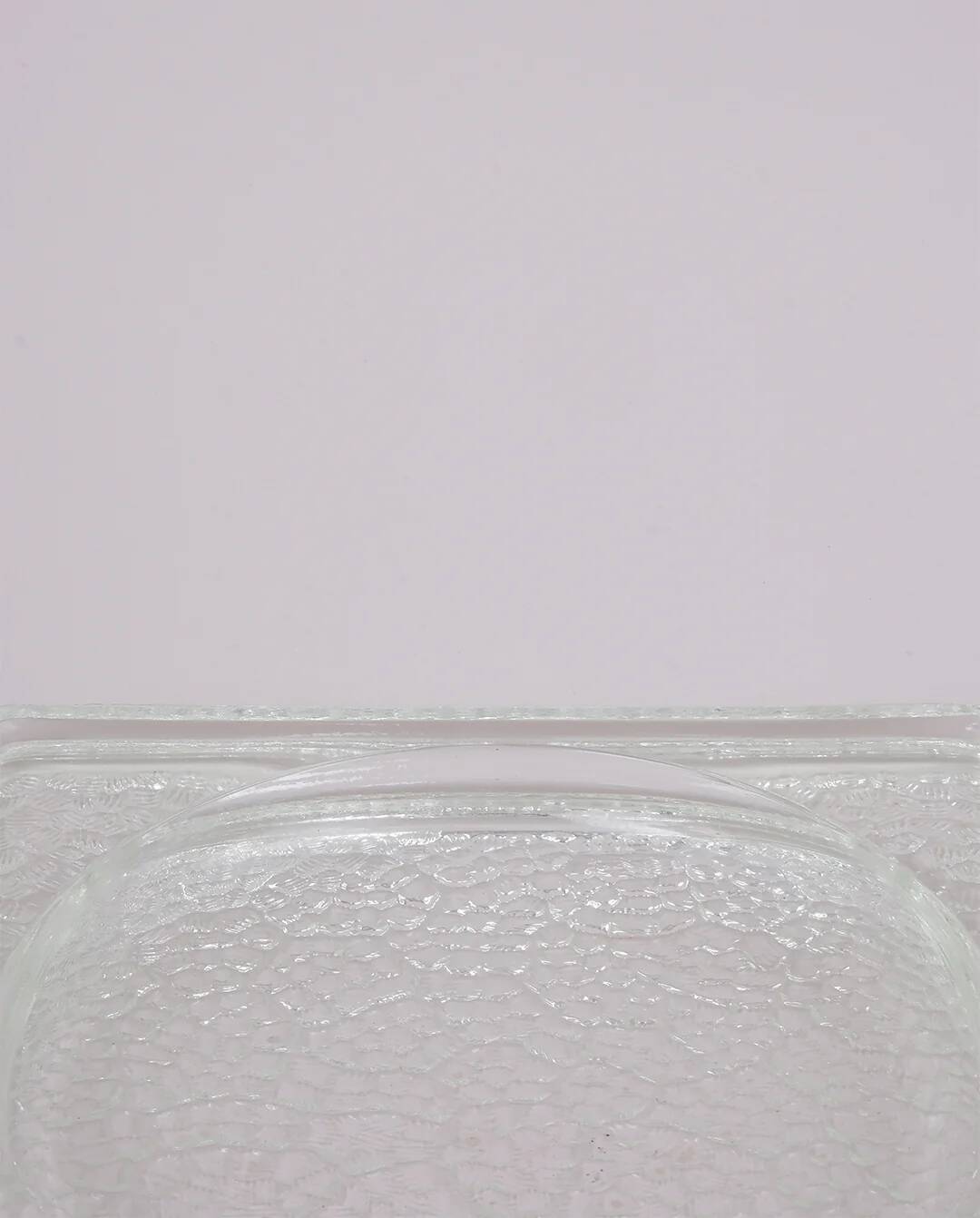 Pressed glass pocket emptier