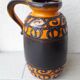 Vase en céramique orange et marron