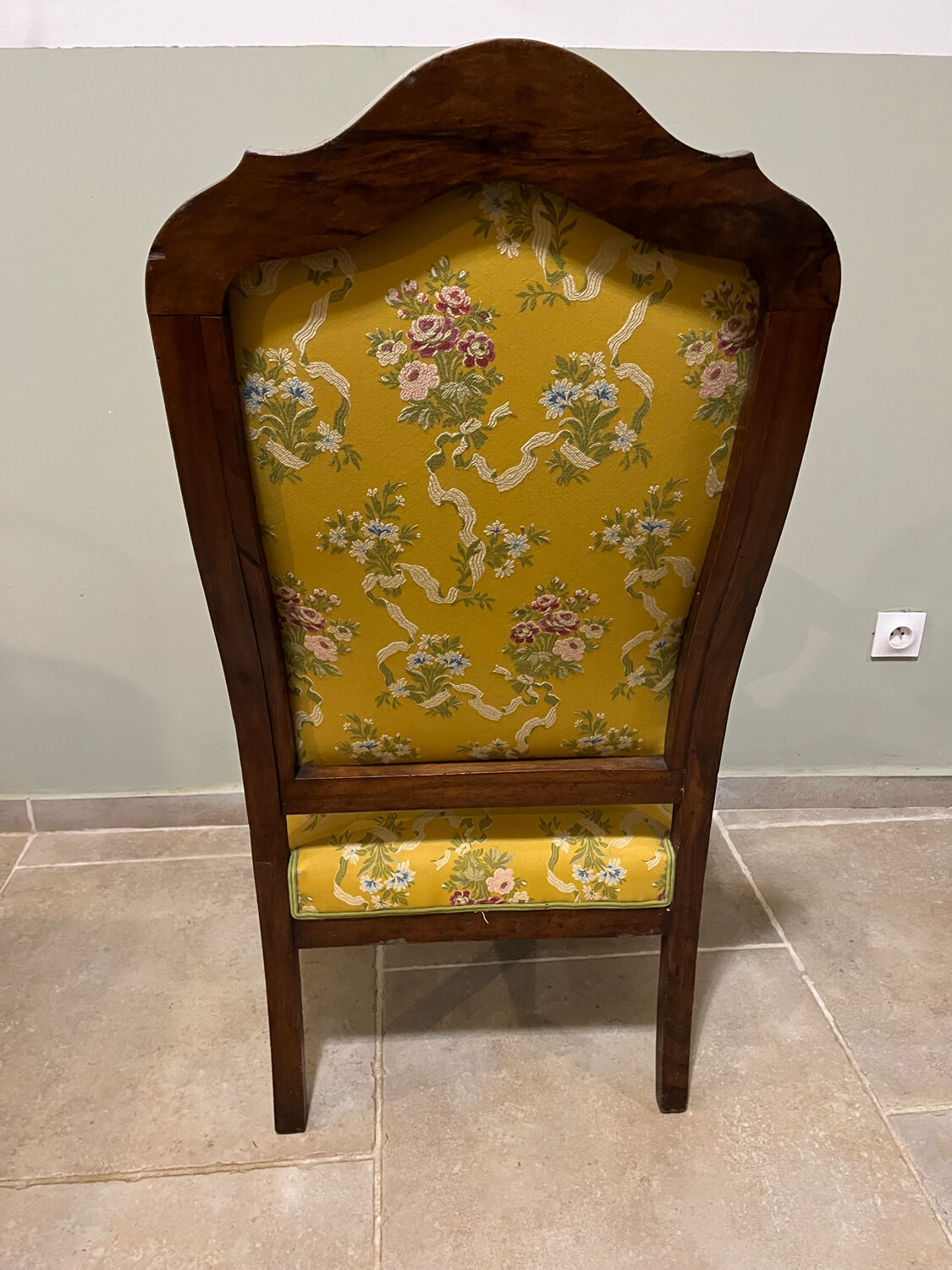 Louis XV style cabriolet armchair in solid wood, yellow floral fabric.