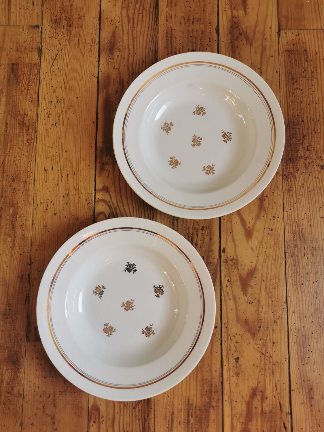 Vintage mismatched yellow and gold soup plates