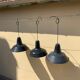 Three industrial suspensions in black and white enamelled sheet metal large format