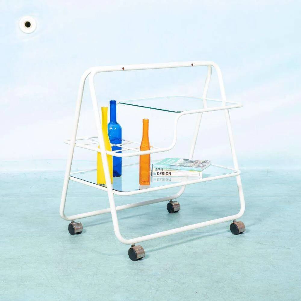 Space age dessert trolley from the 1970s, with metal tubes and glass trays.