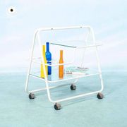 Space age dessert trolley from the 1970s, with metal tubes and glass trays.