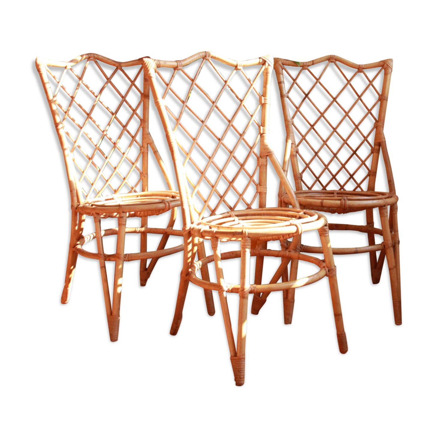 Trio of chairs in rattan Louis Sognot 50 60