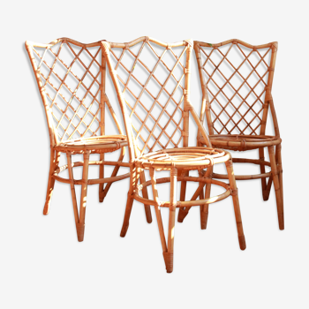 Trio of chairs in rattan Louis Sognot 50 60