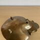 Vintage bronze shell emptier