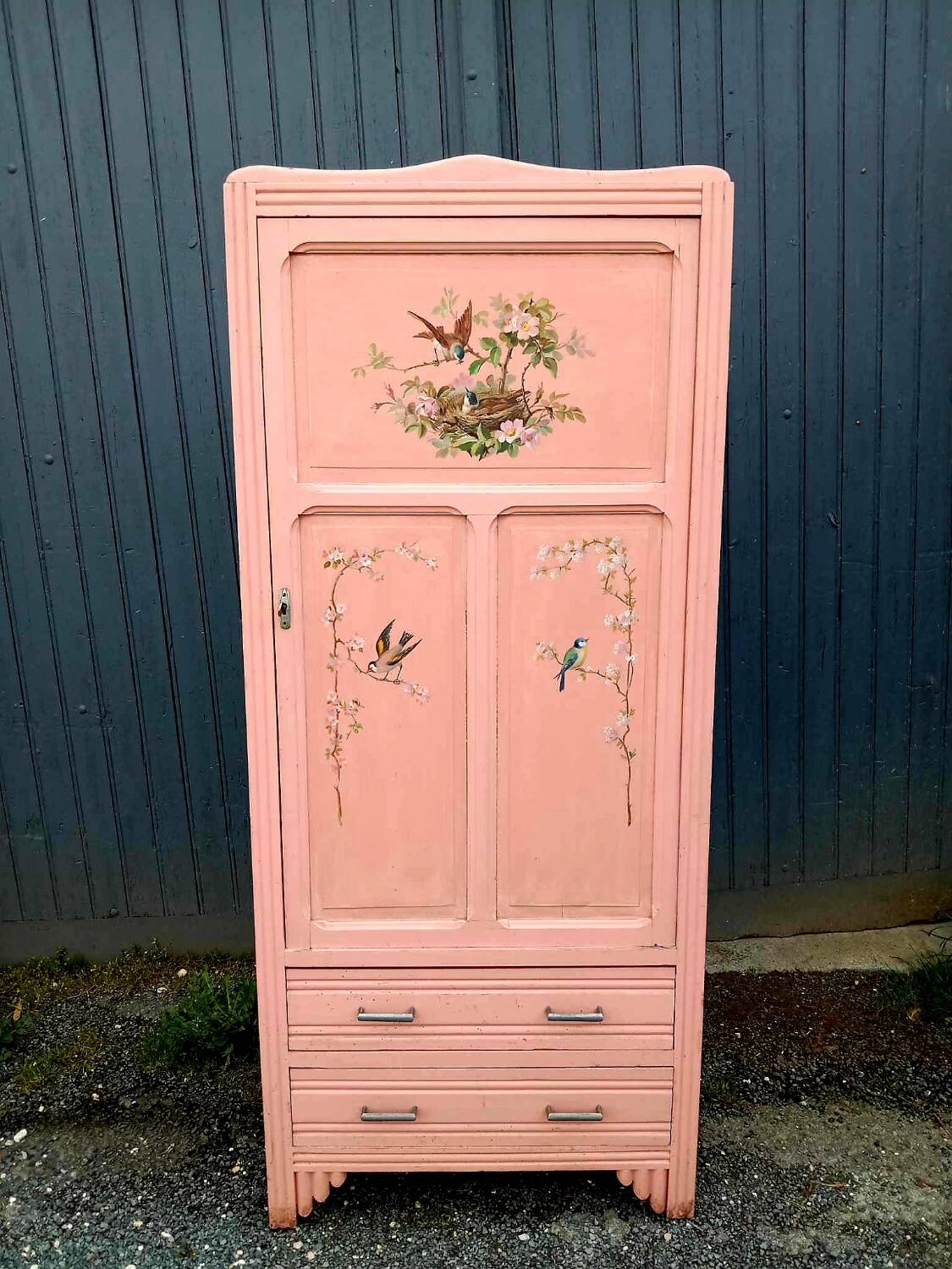 Old pink Parisian cabinet with painted decor