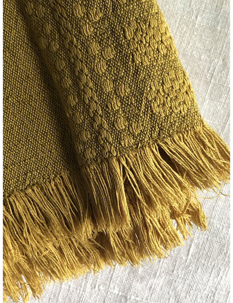 Old damask tablecloth tinted curry yellow