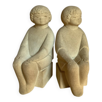 Pair of Marbell Stoneart stamped stone bookends
