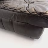 Vintage corner sofa composed of 3 modules in black leather with integrated bed.