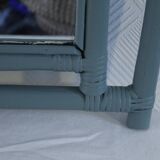Sage green painted rattan mirror