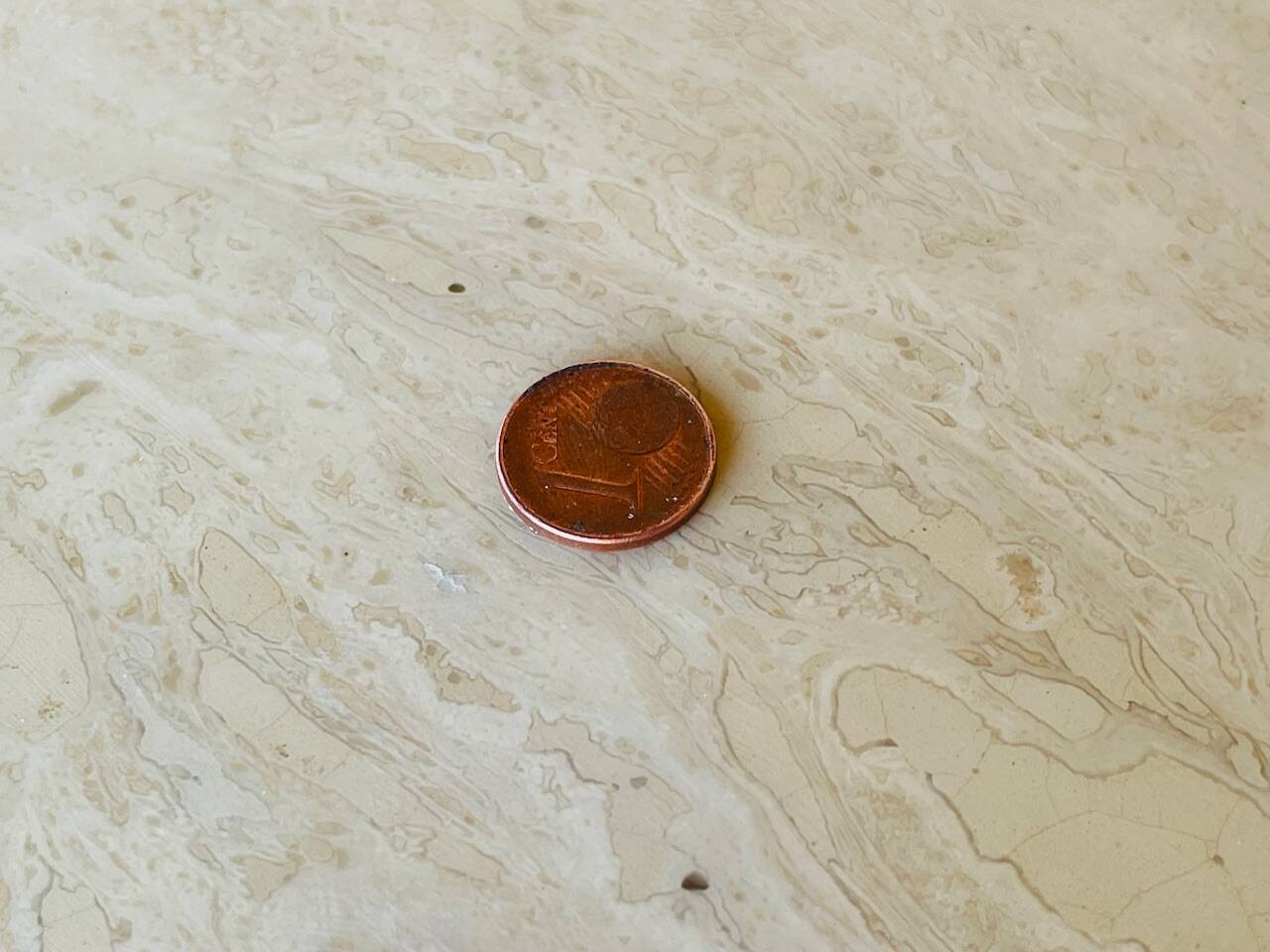 Vintage side table in travertine, circa 1980s.