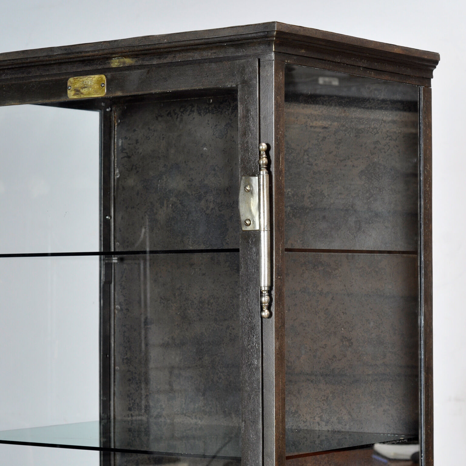 Polished iron medical cabinet, 1910s