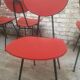 Lot of 6 red chairs in faux leather metal compass feet