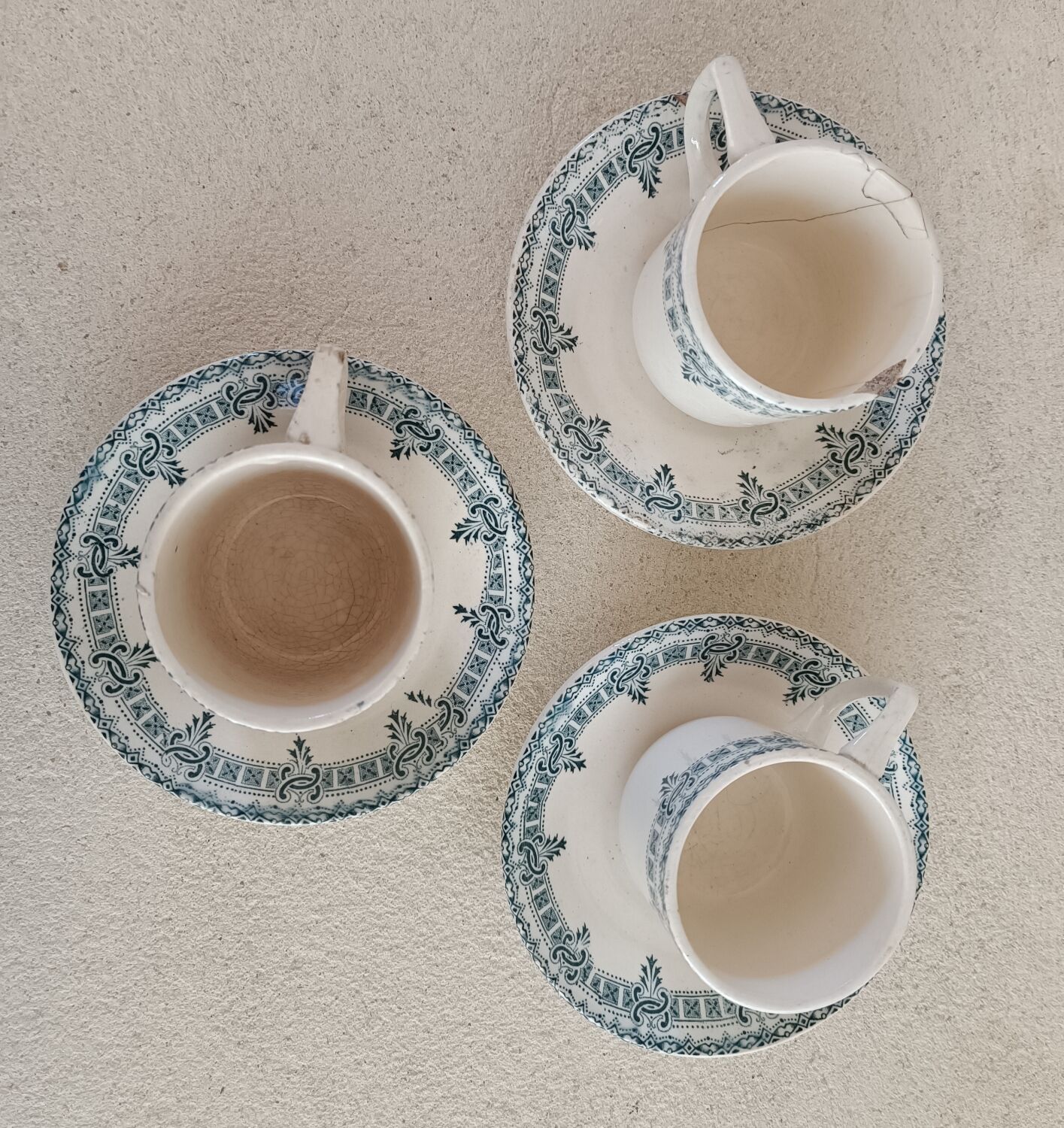 3 cups and saucers iron earth