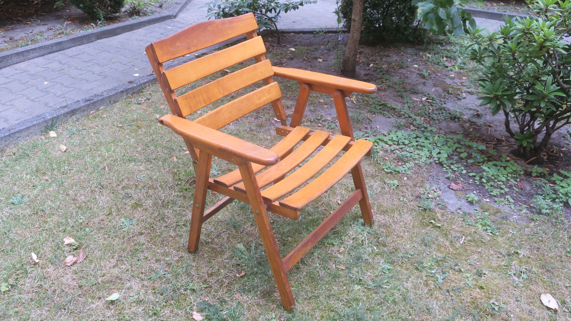 Mid century patinated wood folding garden or patio elbow chair, 1960s