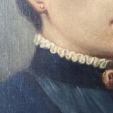 Oil on canvas portrait in an antique gilded wooden frame.