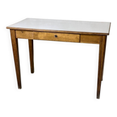 Vintage 1950s desk made of solid wood and formica.