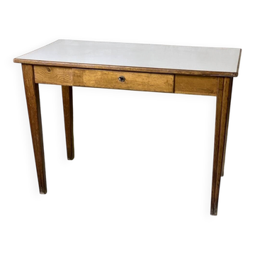 Vintage 1950s desk made of solid wood and formica.